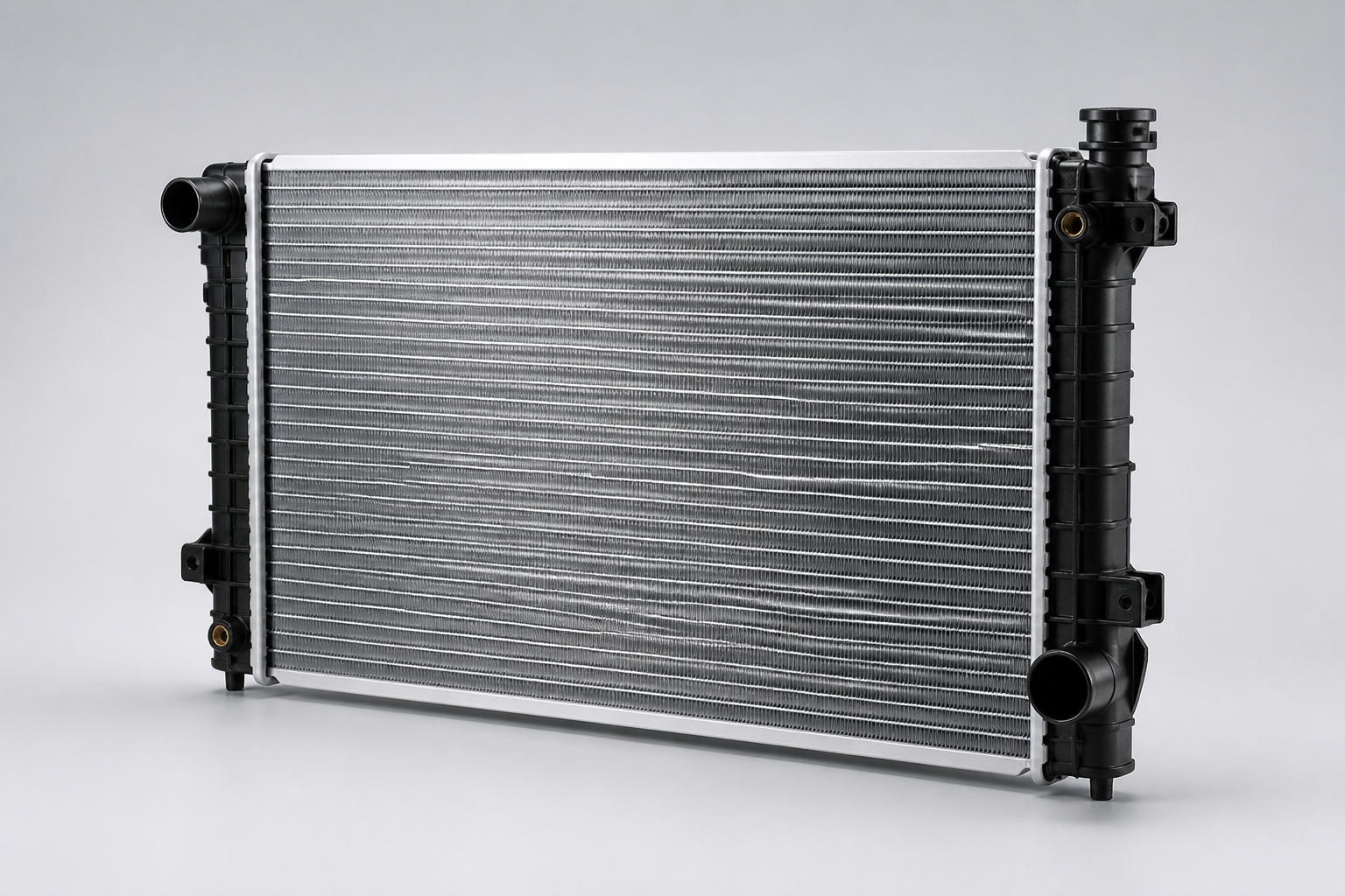 Automotive aluminum radiator with plastic side tanks